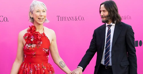 Keanu Reeves, Alexandra Grant share kiss on red carpet